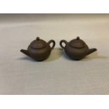 2 Small Chinese clay Saki tea pots stamped to the bases