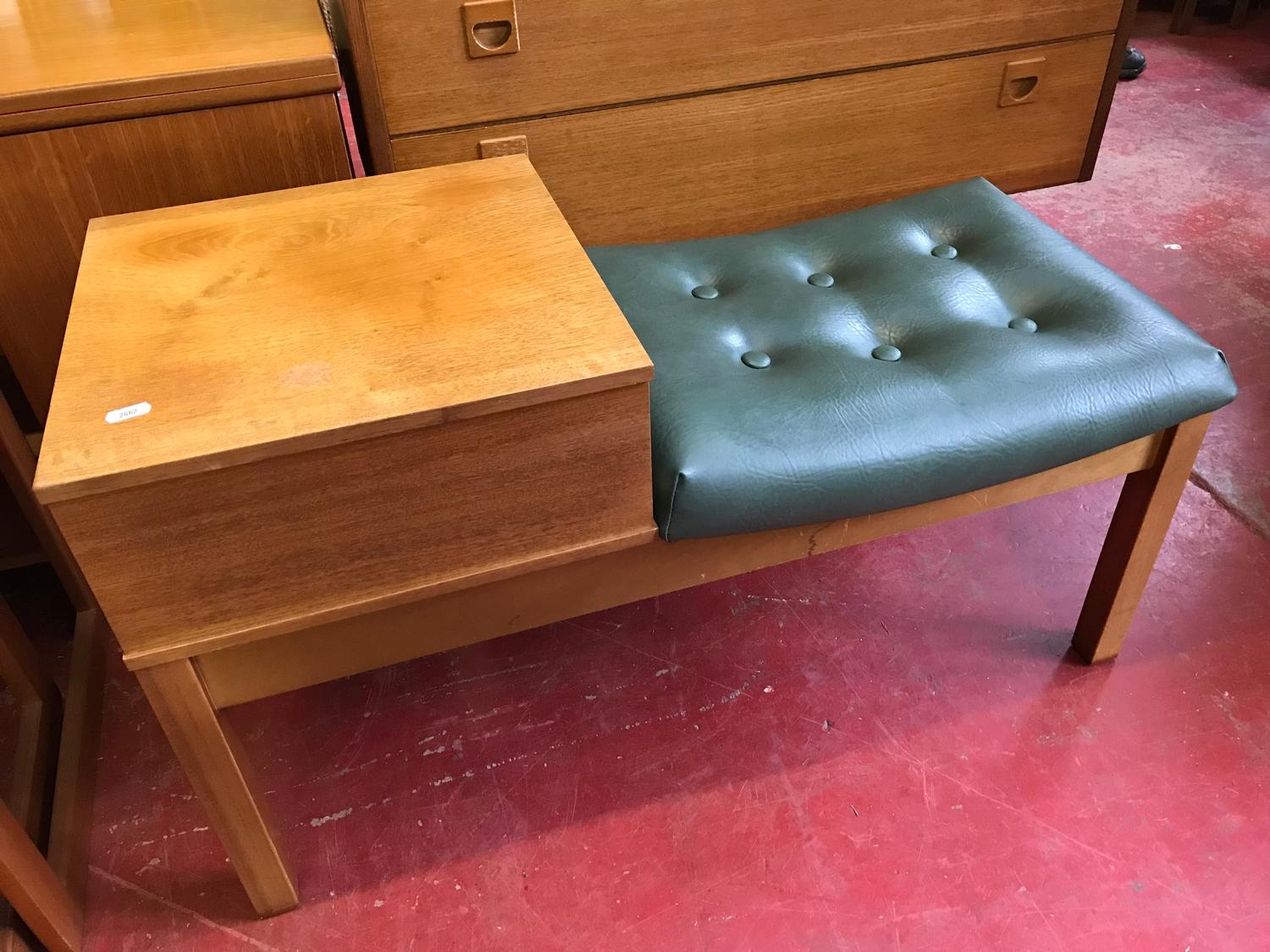 Retro telephone table styled with button seated cushion