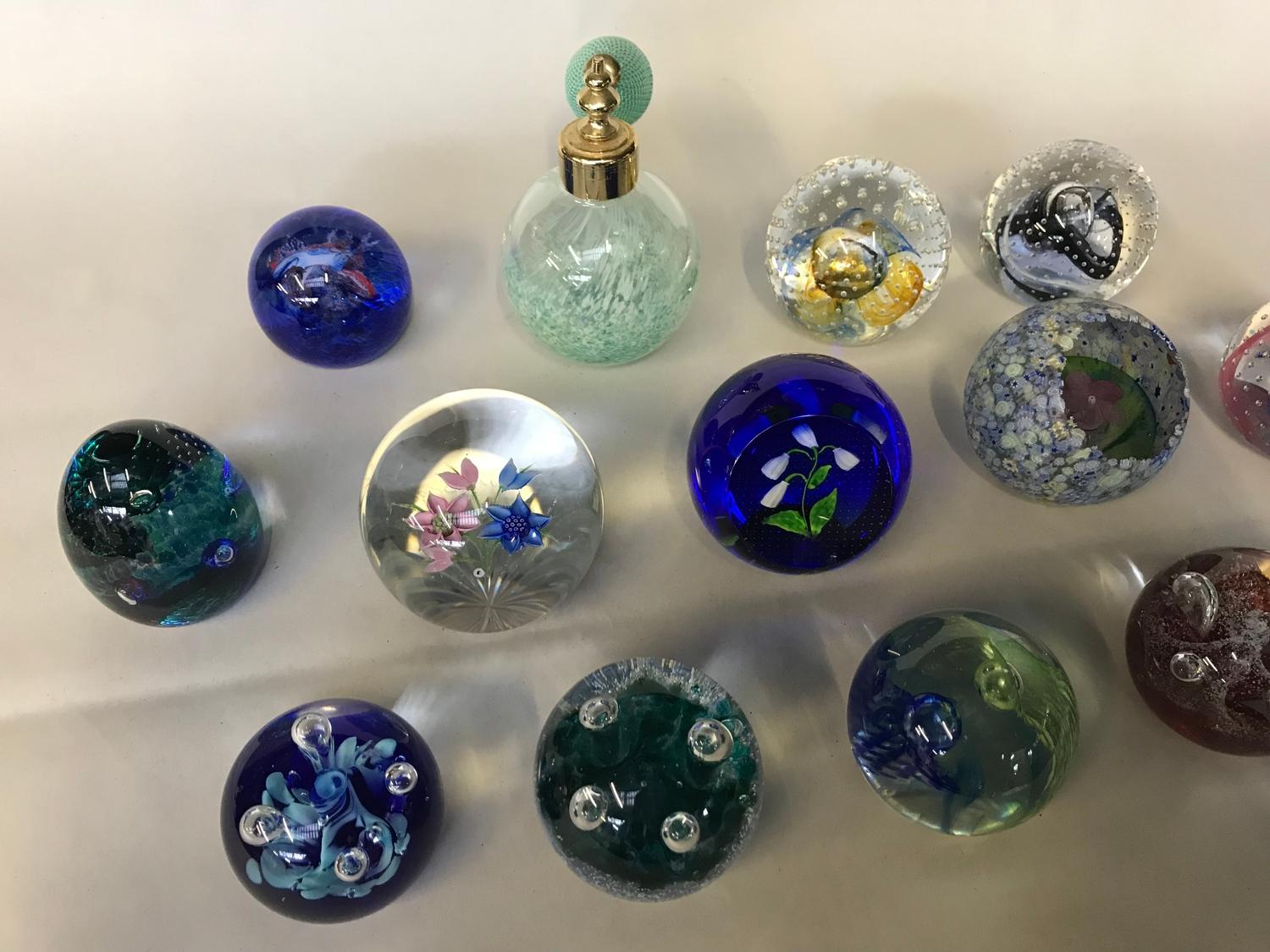 A Collection of 13 Caithness Scottish paperweights and Caithness perfume atomiser. Paperweights
