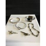 A Lot of silver jewellery which includes a pair of hand made silver earrings, Hand made silver and