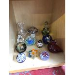 A lot of various paperweights and perfume bottles to include names; Wedgwood, Merlin & Isle of Wight