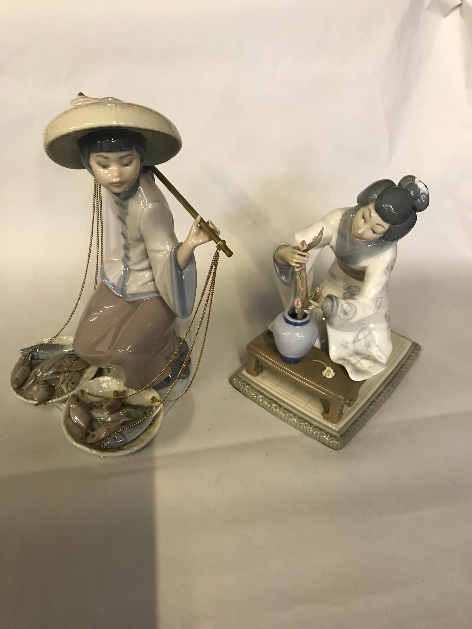 2 Lladro oriental figures, Geisha girl organising flowers & Lady carrying fish