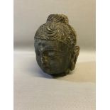 Contemporary hard stone Chinese Buddha head. Measures 23cm in height