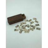 Hand carved miniature domino case with bone dominos. From France Biarritz.