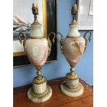 A Pair of heavy onyx and gilt metal table lamps, styled with swan head handles, both working