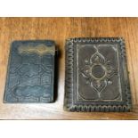 2 Victorian photo albums, one filled and the other is partly filled.