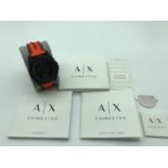 AX Armani Exchange connected black silicone hybrid watch with instruction booklets and tool.