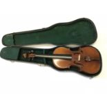 An antique violin with fitted case