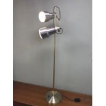 Retro double spot light, Styled on a gilt metal pole and a steel look finish to the light shades.