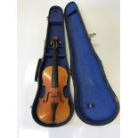 A child's violin with fitted case