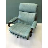 1960s relaxer armchair. styled with blue rexine material.