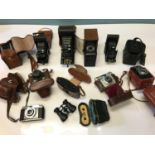 A Large selection of vintage bellow and various cameras, Includes names such as voigtlander, Kodak