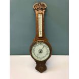 A 1900s oak cased Aneroid Barometer