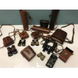 A lot of various vintage opera and field binoculars, Various military scope carry cases(Empty) Kodak