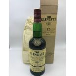 The Glenlivet 12 year old single malt Scotch Whisky. Full, Sealed, wrapper and box.