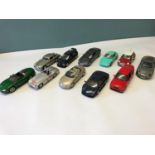 A collection of various vintage car models to include; The Beanstalk Group Jaguar XKR,Hot Wheels