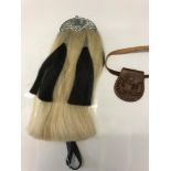 Good quality Horse hair sporran and childs leather sporran.