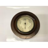 Solid oak drum cased barometer. 27cm in diameter