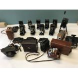 A Large collection of Bellow kodak cameras, Pathe cine camera & brownie cine cameras.