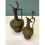 Antique Iraqi/ Middle Eastern copper cobra snake handle ewer pitcher jug and one other. Tallest