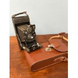 Goerz Compur bellow camera with leather carry case.