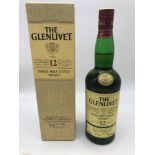 The Glenlivet 12 year old single malt Scotch Whisky. Full, Sealed, wrapper and box.