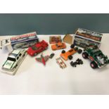 Hess patrol car, Monster truck with bikes, both boxed. Together with various Burago racing car