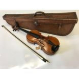 An antique violin, together with a bow named 'Pindar', together with an original antique leather