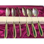 A Set of 6 Russian silver gilt and enamel teaspoons. Makers Adam Yuden. 1840-1878. St Petersburg.