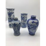 A Lot of four antique blue and white 19th century and early 20th century oriental vases,tallest 19.