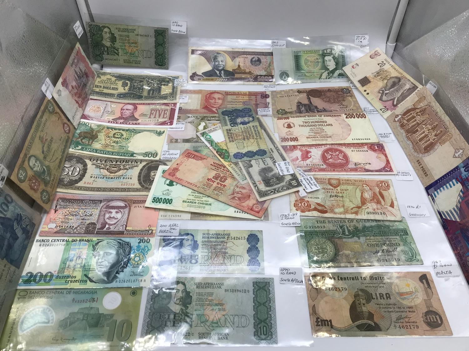 A Large collection of mixed world bank notes