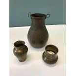 Tibetan copper vessel pot together with 2 ornate brass Indian vases. Vessel measures 25cm in height.