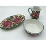 A quantity of three Wemyss ware porcelain items in 'Cabbage Rose' design. Pin dish damaged