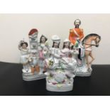 A lot of three Victorian Staffordshire flat back figurines, tallest 13cm