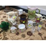 A lot of Victorian and modern water jugs which includes Green glass sugar and cream. Crystal