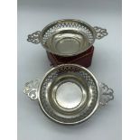 A Pair of Birmingham silver pierced double handled pin dishes. makers Synyer & Beddoes, dated 1921