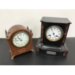 2 Antique mantle clocks, One in an Edwardian era, styled with trim inlay. The other has a bell chime