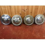 Vintage MG hub cap with three others marked embossed with the letter M