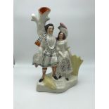 A Victorian Staffordshire figure titled "Burns & his Mary" c1840. Stands 30cm in height.