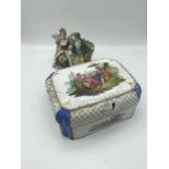 Meissen Large trinket box (Damaged) together with a Chelsea pottery couple figure. Box measures