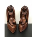 A Large pair of hand carved Balinese nude lady figurine bookends. Measure 33cm in height.