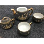 A Satsuma Japanese hand painted tea set.