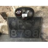 1920s-1930s Rear number plate with light attachment in ET style.