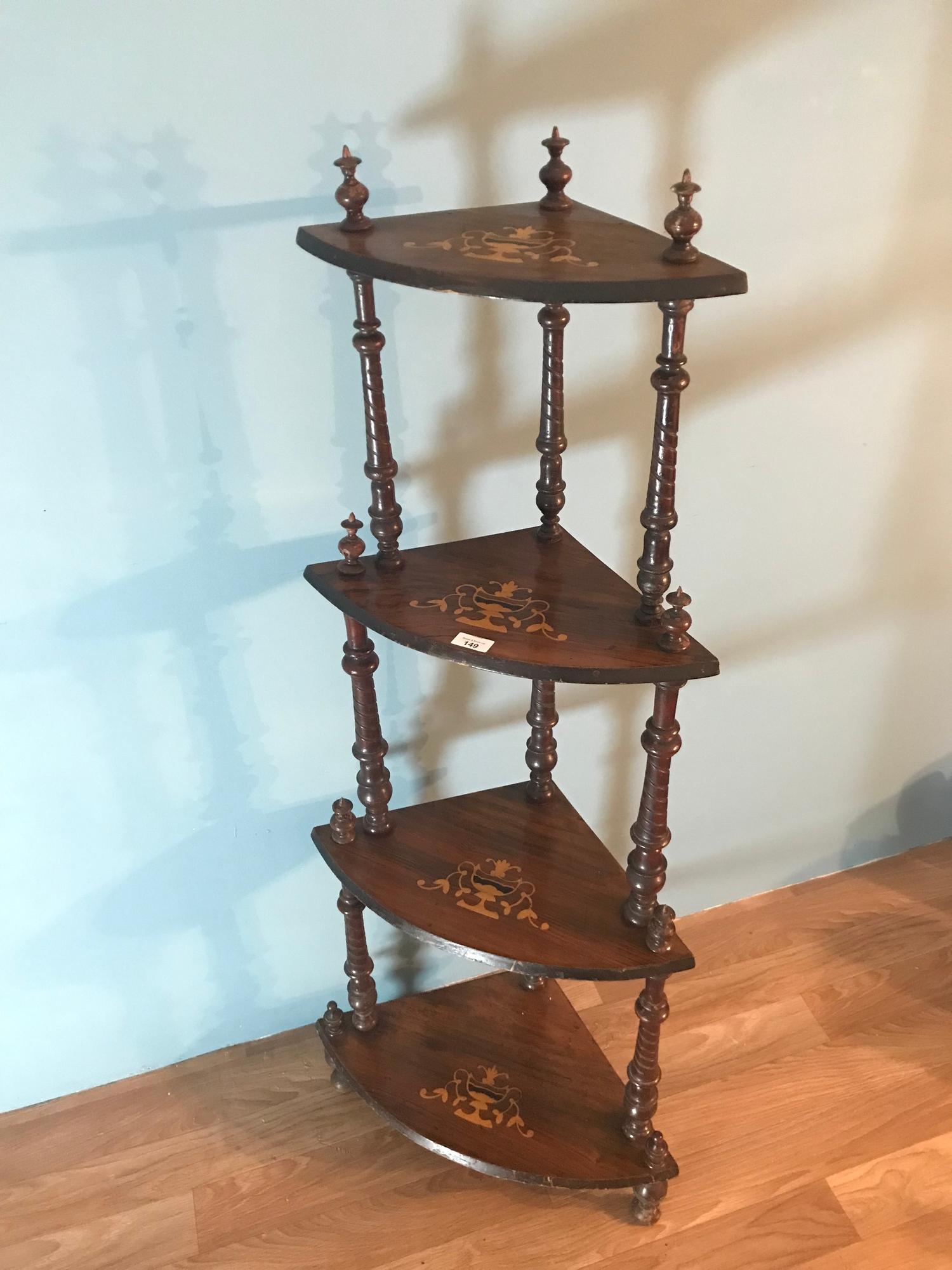 An Edwardian inlaid 4 tier what not. Stands 135cm in height