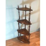 An Edwardian inlaid 4 tier what not. Stands 135cm in height