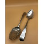 A lot of 2 Georgian Edinburgh silver serving spoons, Makers JN & Dated 1808. Weighs 132.15grams