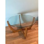 A retro wood and glass circular table. Measures 45cm in height & 80cm in diameter