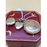 9ct gold heart locket, together with small round 9ct gold back and front locket and a large 9ct gold