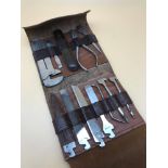 An Antique Masonic lodge travel tool kit. Embossed with masonic emblem on each tool part. Fitted