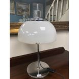 Genuine Harvey Guzzini table lamp, Rise and fall movement. Styled with a mushroom shade. Has